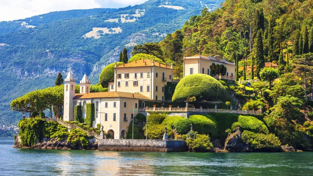 Elegant wedding ceremony at a luxury Lake Como villa, showing how a destination photographer uses the dramatic Italian scenery to create timeless memories.